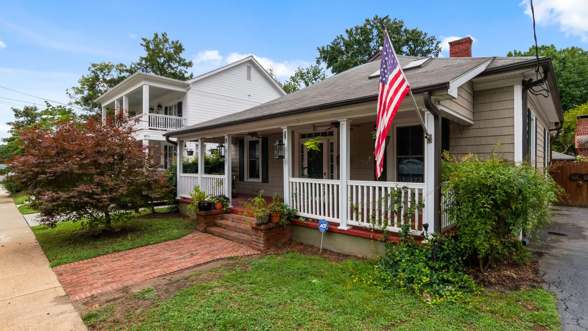 Classic bungalow with a covered front porch and updated windows